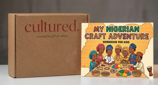Cultured branded box with a children's book titled 'My Nigerian Craft Adventure Workbook for Kids' on a gray background.
